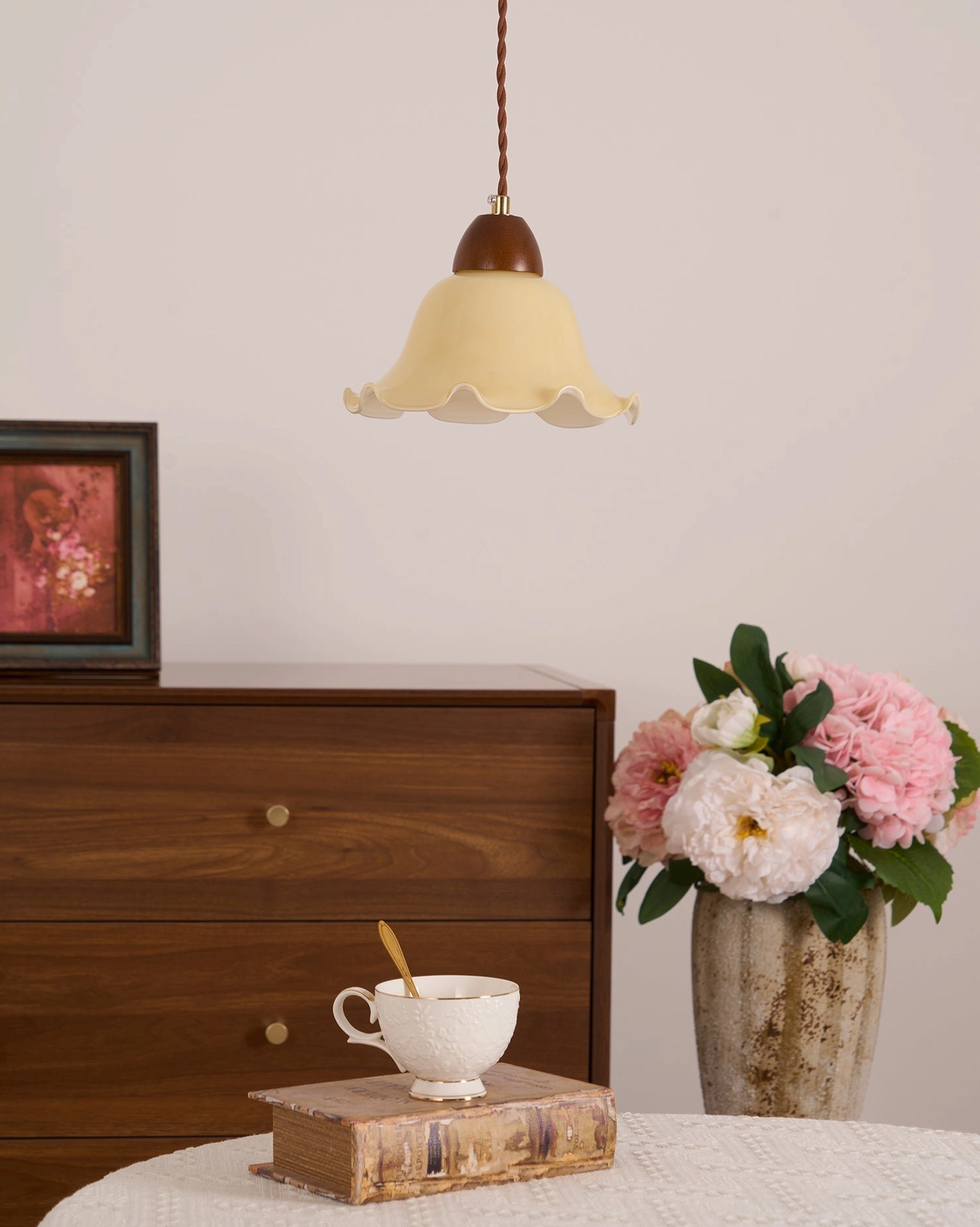 Rowan flower-shaped pendant light in transitional interior design with mixed vintage and modern elements