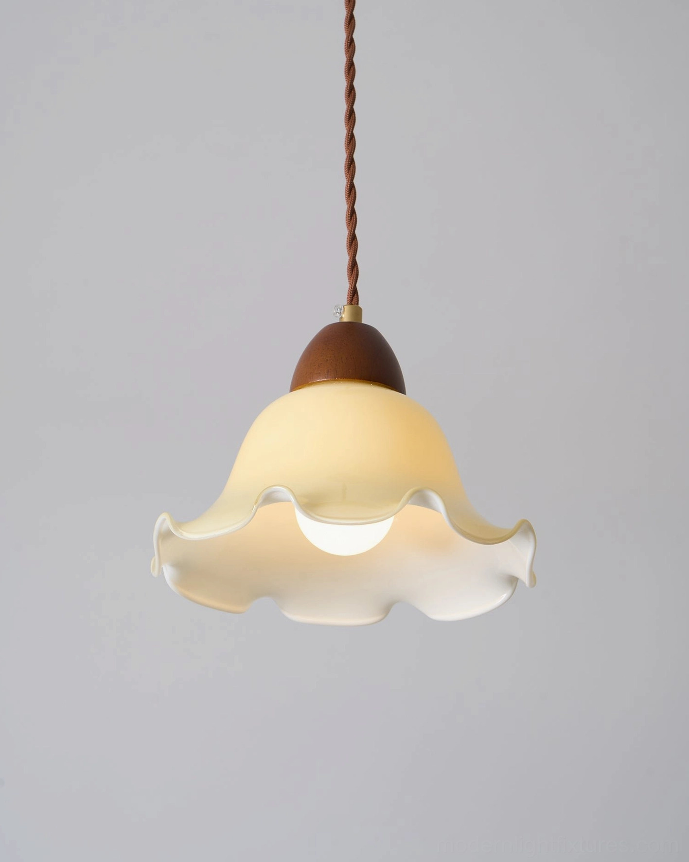 Rowan flower pendant lamp dimmed for evening ambiance in intimate residential interior design