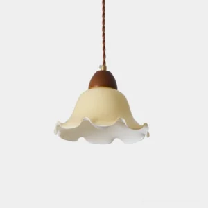 Rowan flower-shaped pendant light with frosted glass shade and walnut wood accent, close-up studio shot
