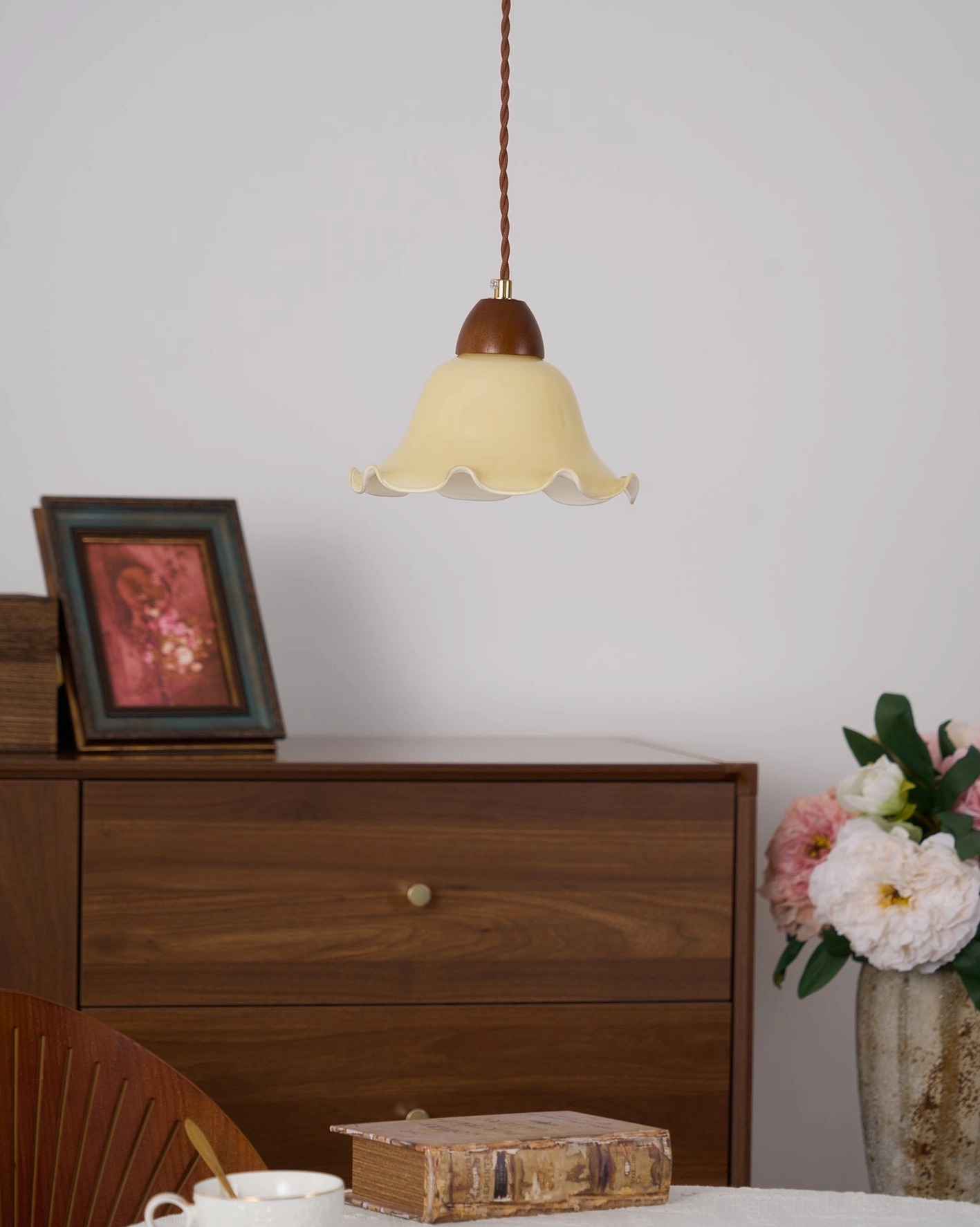 Rowan flower-shaped pendant lamp shown in Scandinavian-inspired home setting with natural materials