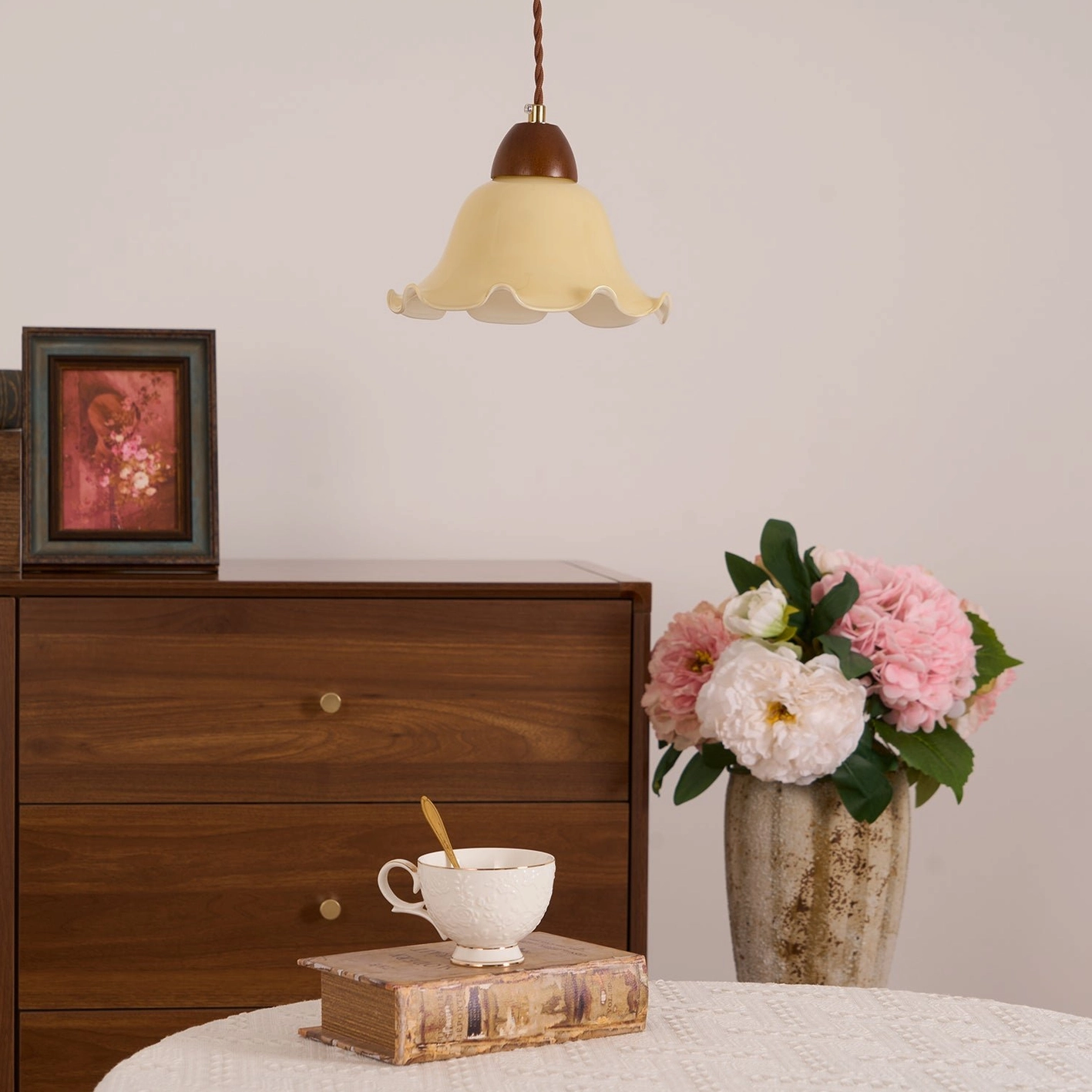 Rowan flower pendant lamp creating focal point in contemporary dining room with botanical decor