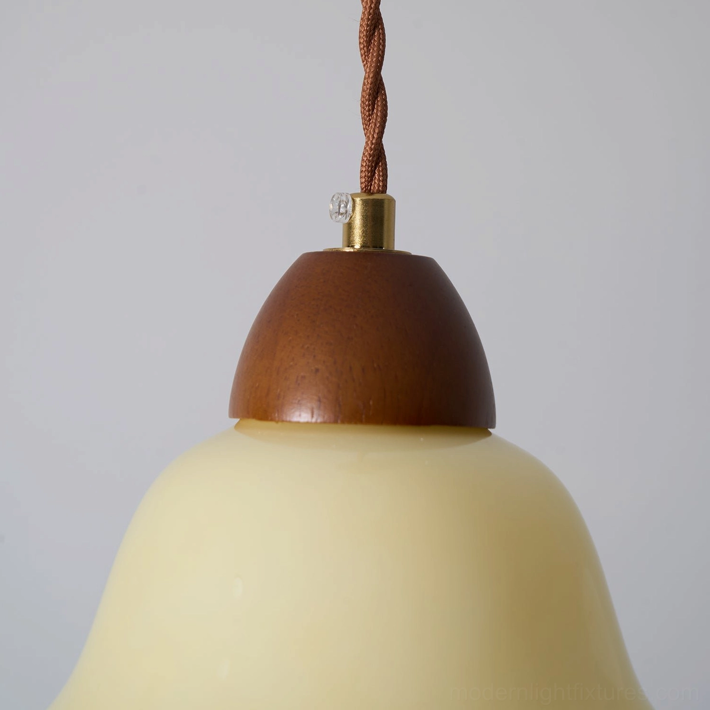Multiple rowan flower pendant lights on sloped ceiling installation in contemporary loft space