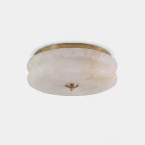 Rowen alabaster flush mount ceiling light with brass trim ring and finial, studio front view overhead angle, natural alabaster shade with warm brass hardware