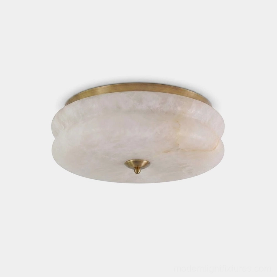 Rowen alabaster flush mount ceiling light with brass trim ring and finial, studio front view overhead angle, natural alabaster shade with warm brass hardware