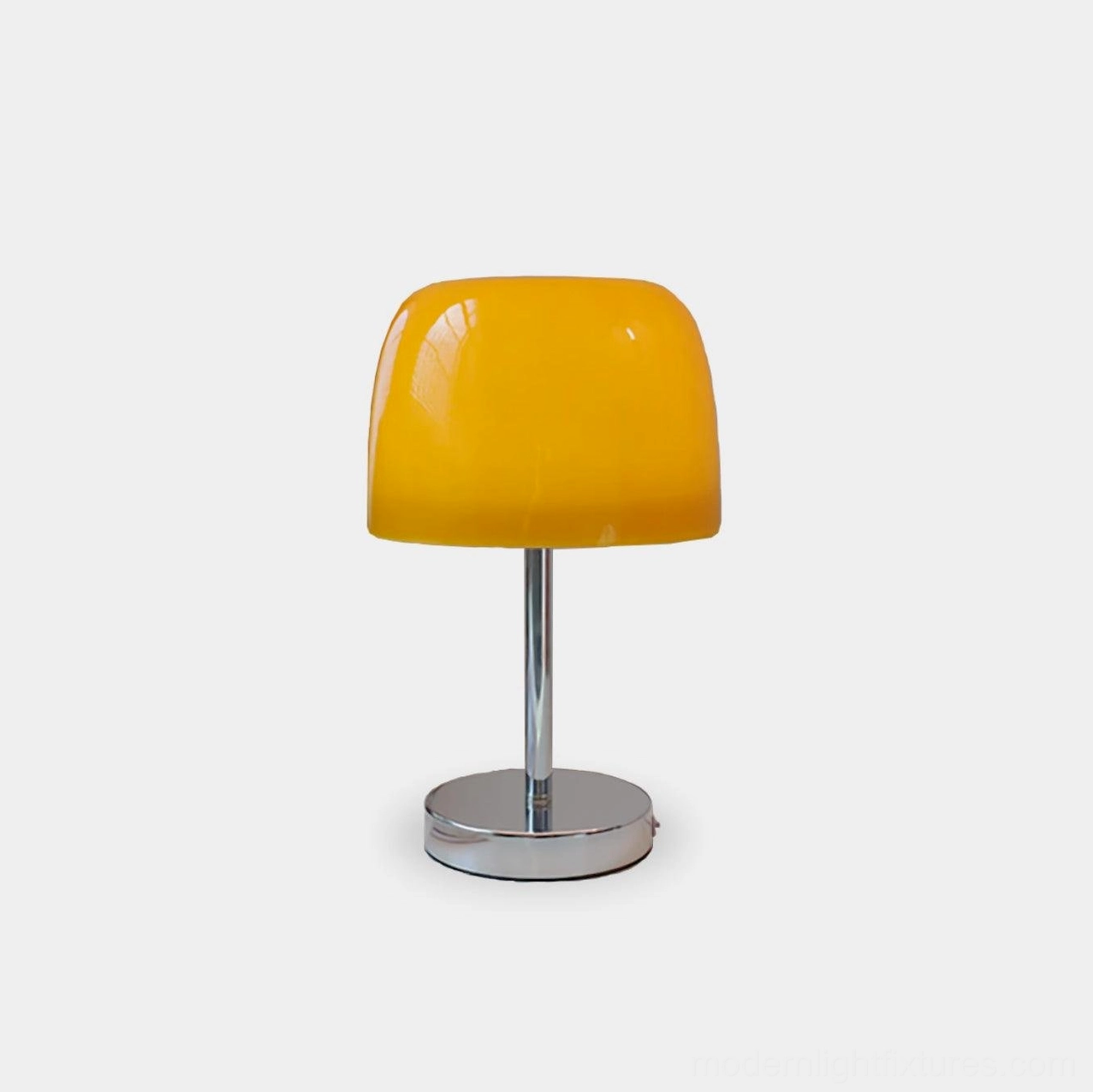 Roxboro amber glass table lamp with chrome base front view on white background