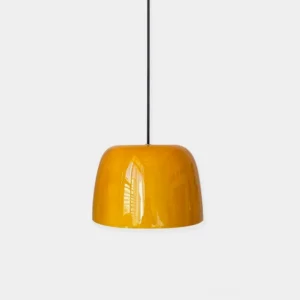 Roxboro modern amber glass pendant light with glossy finish, frontal studio view showing contemporary hanging fixture design