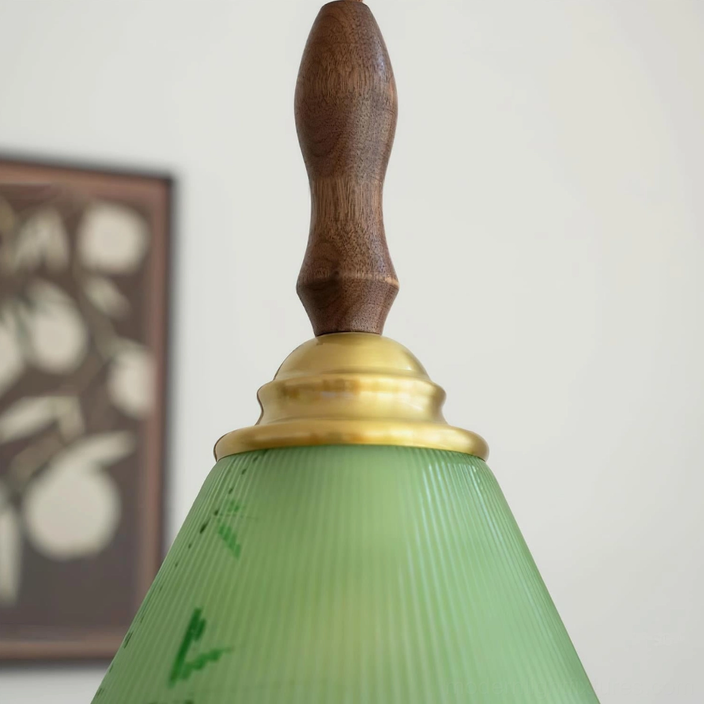 Botanical pendant lamp detail showing premium green ribbed glass with bamboo motif and brass fitting