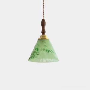 Royale Botanical Pendant Light with green ribbed glass shade and bamboo pattern, front low angle view against white studio background