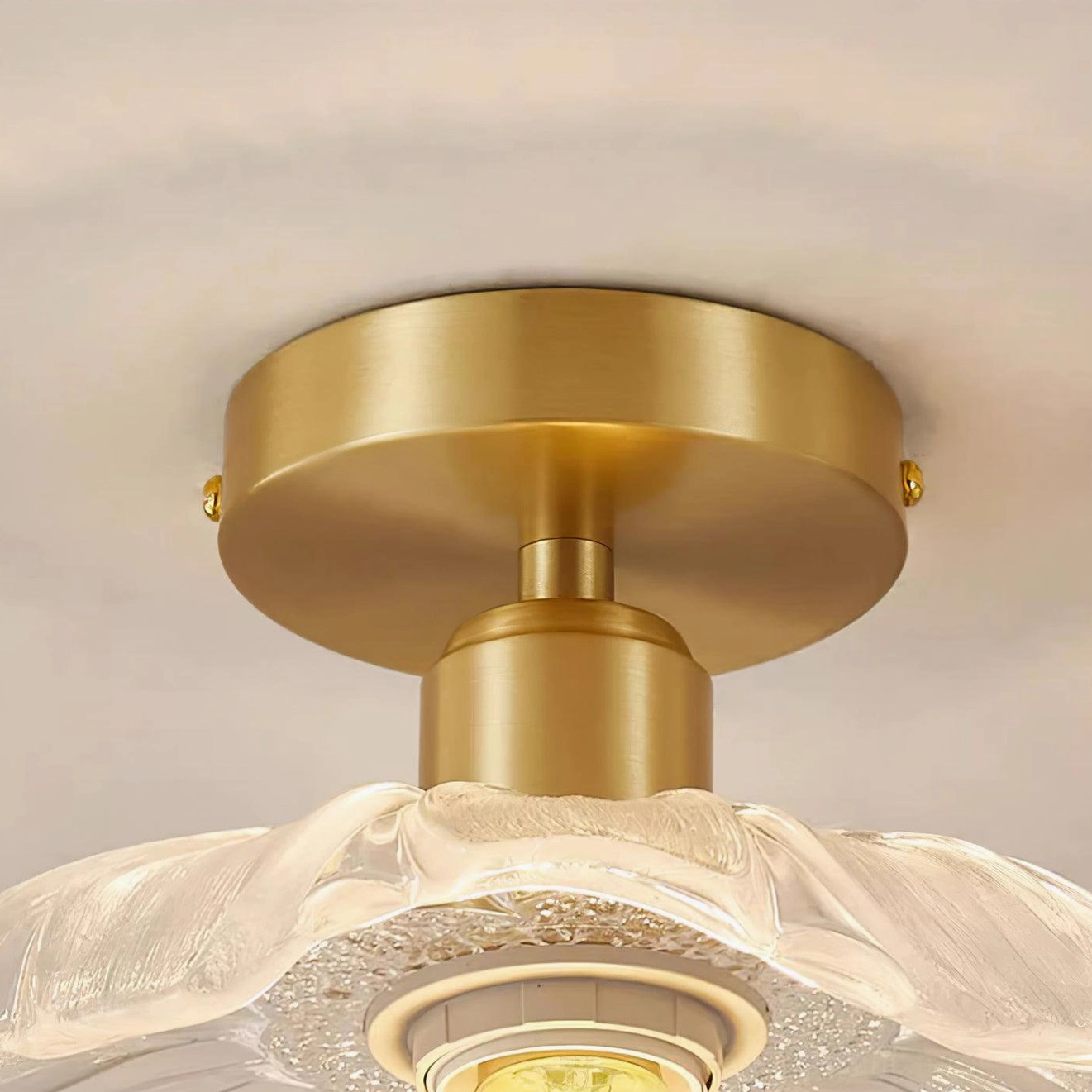 Ruffled glass ceiling light fixture detail view emphasizing vintage craftsmanship and translucent clear glass quality