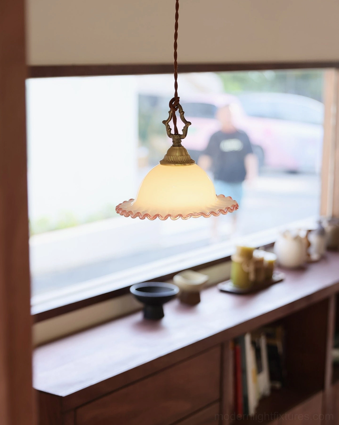 Small ruffled glass pendant light above entryway console table with window - French country foyer fixture