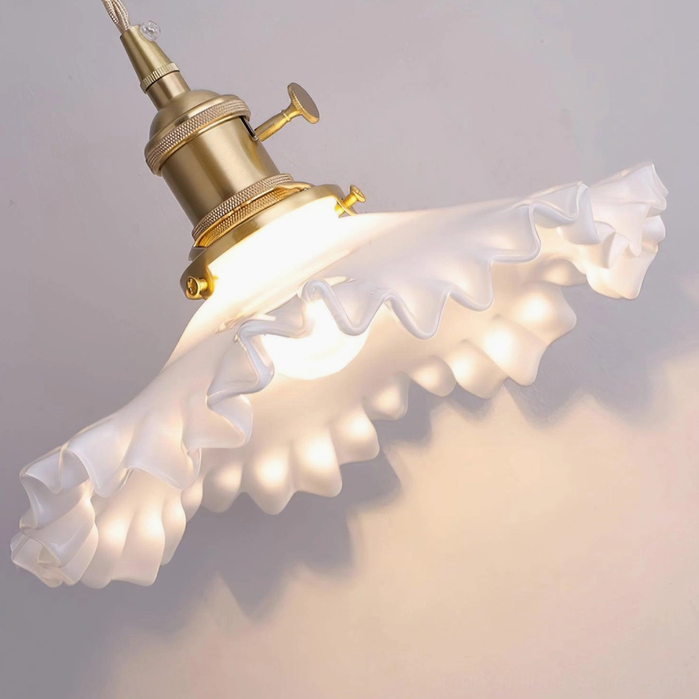 Ruffled glass pendant light in modern home decor setting, warm color temperature lighting demonstration