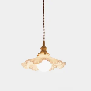 Ruffled glass pendant light with frosted white shade and brass base, shown against plain white background, front view