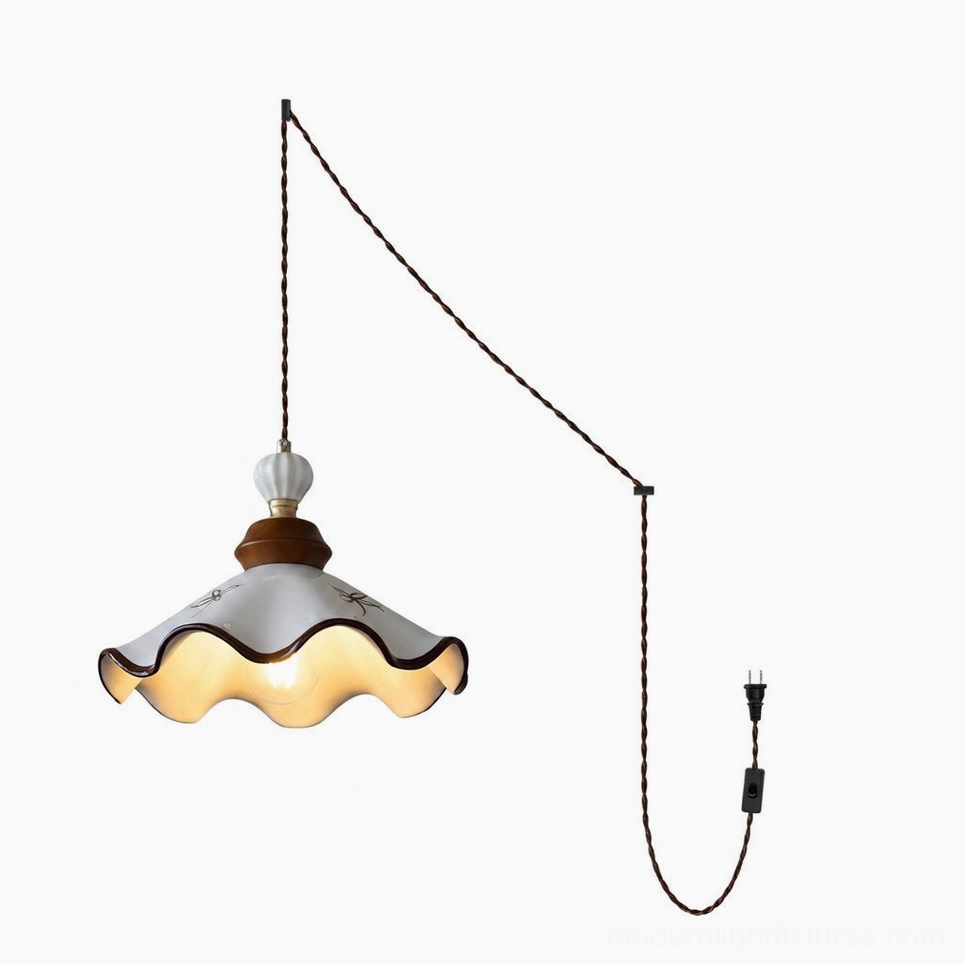 Ruffled Lotus ceramic pendant with dramatic wavy lotus-leaf edge and sculptural hand-painted brown trim detail
