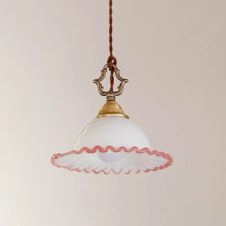 Ruffled pink glass pendant light in warm brass finish - complete product shot showing shade proportions and cord