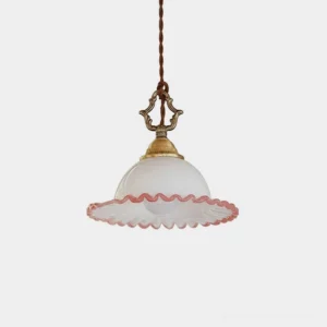 Ruffled pink glass pendant light with brass yoke - vintage-inspired small pendant fixture front view studio shot