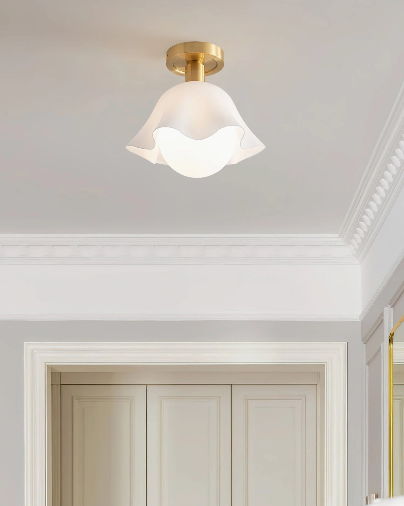 Rustin ruffled glass ceiling light with brass base in residential entryway with crown molding - modern minimalist lighting
