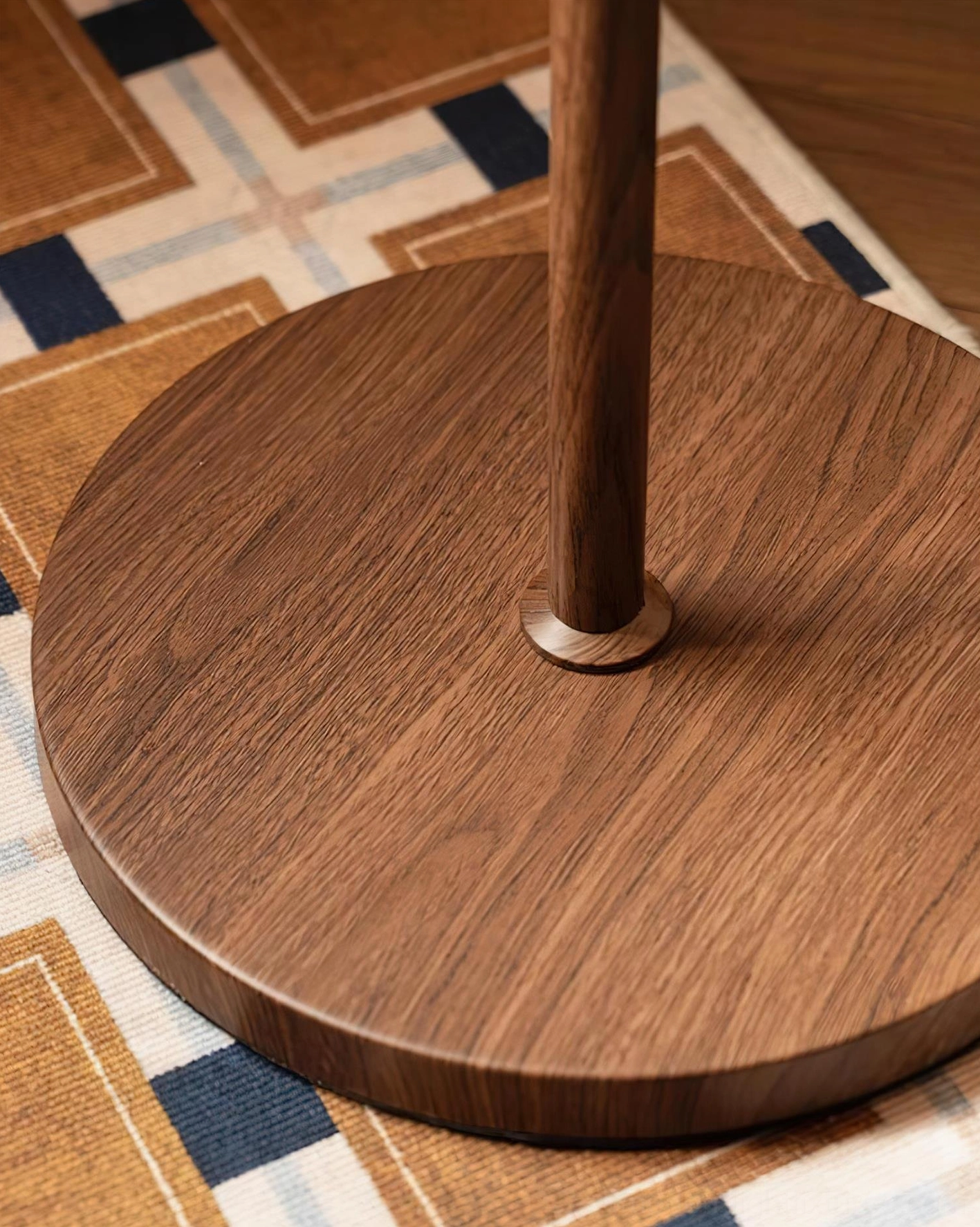 Rustina floor lamp illuminated showing warm light distribution and room ambiance transformation capability