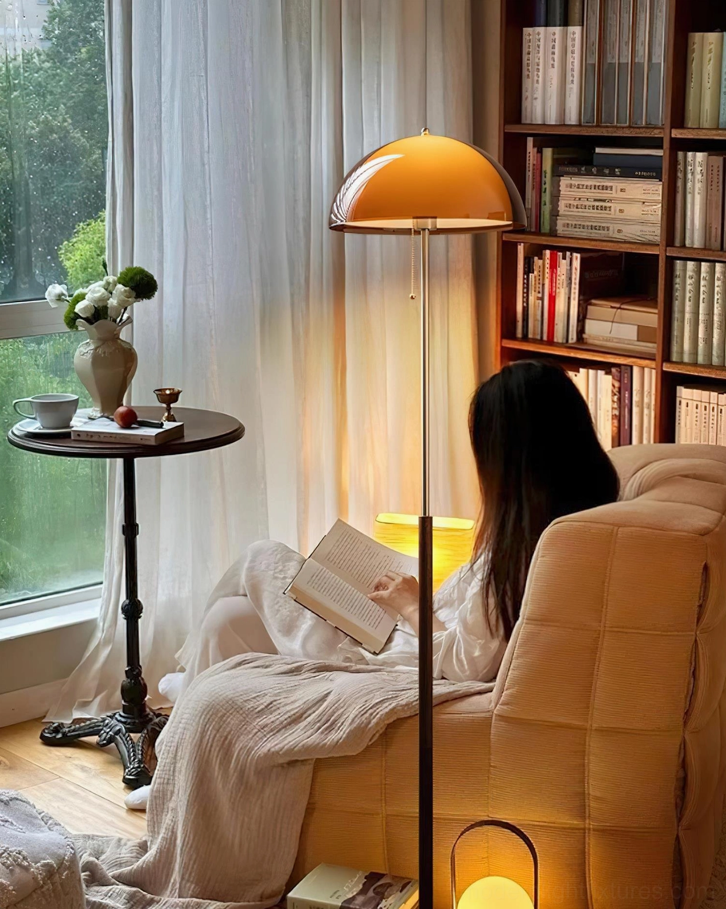 Rustina amber floor lamp in relaxing living room reading space with wide view angle demonstrating cozy evening atmosphere