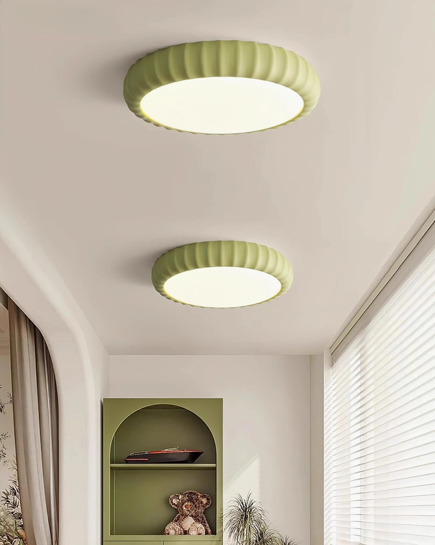Multiple sage green ribbed ceiling light fixtures in hallway entryway - minimalist home decor