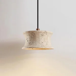 Overhead perspective of Saiko pendant lamp showing bronze fixture connector and black hanging cord against minimalist backdrop
