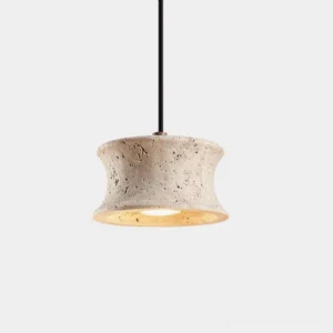 Saiko travertine pendant light with curved waist design and natural porous beige stone texture, front low angle studio shot