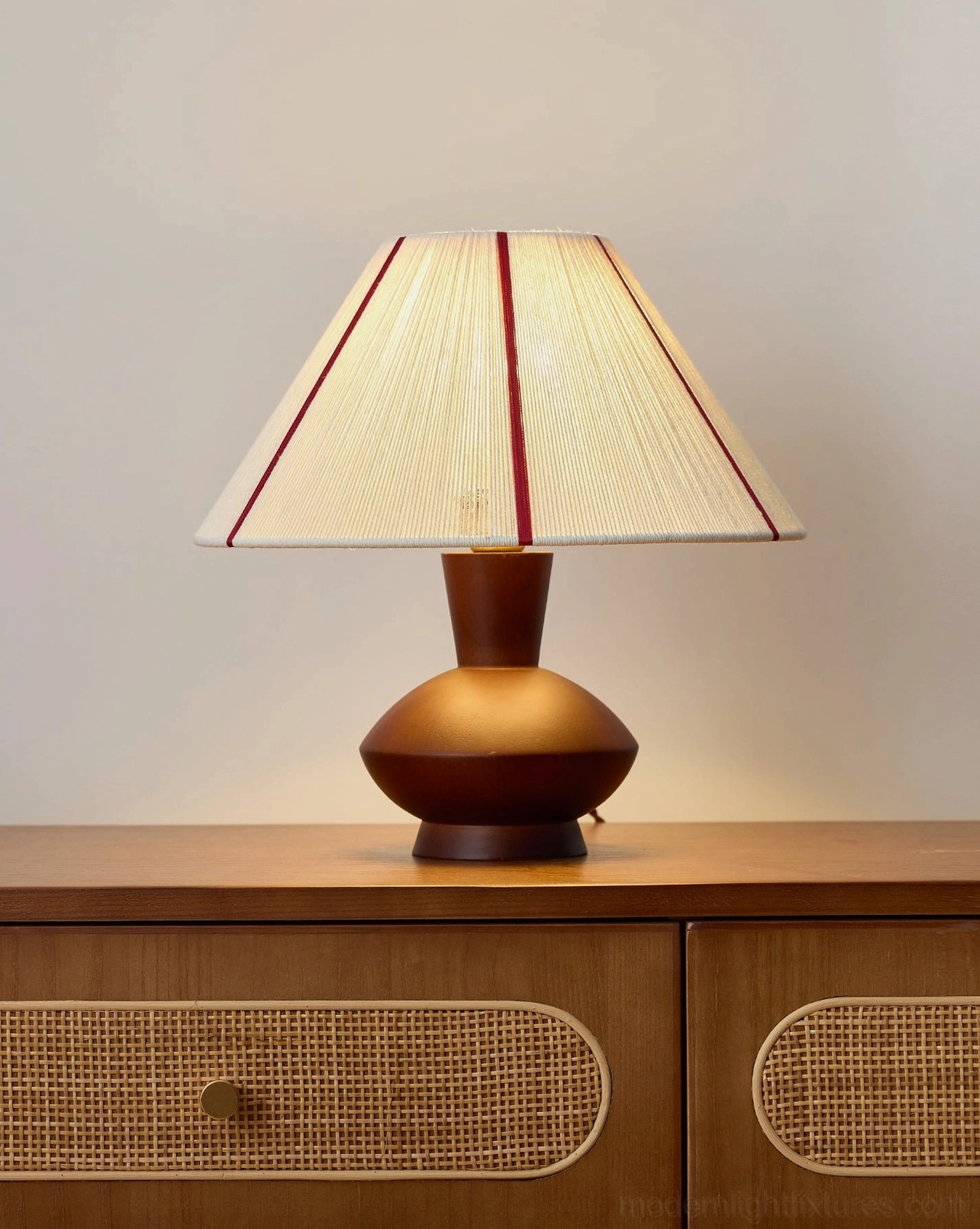 Sandia retro hand-woven table lamp on rattan drawer wooden furniture, warm vintage interior styling, traditional craftsmanship display