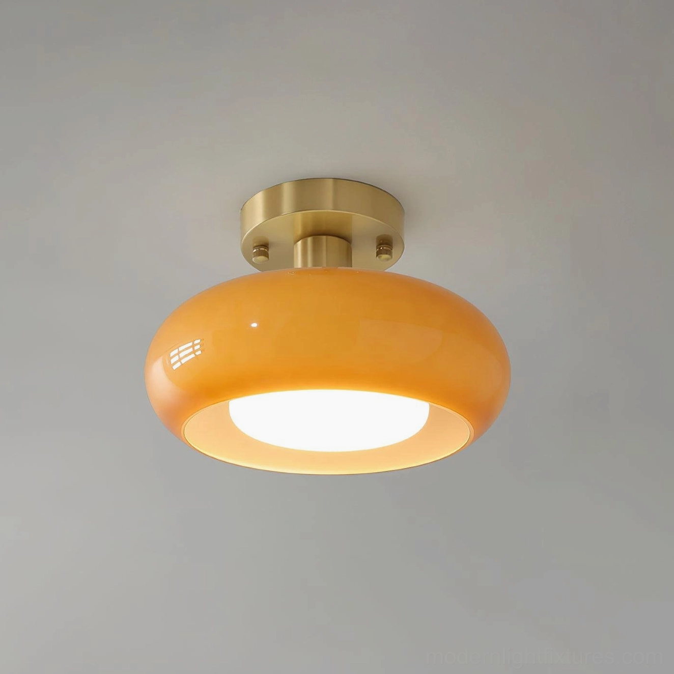 Sanna modern glass ceiling light in gold and orange warm finish for character spaces