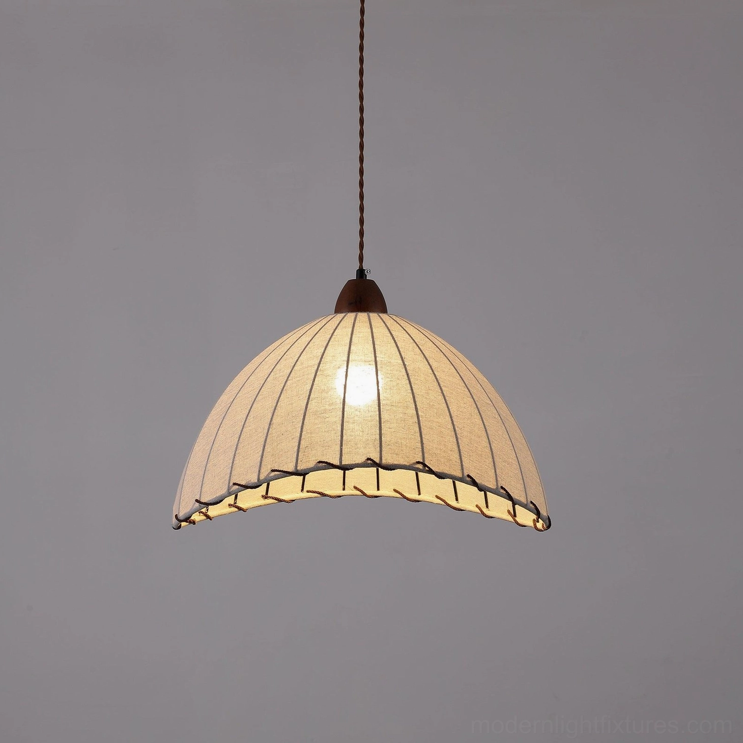 Sanna pendant light dome interior showing light source diffusion through ribbed fabric