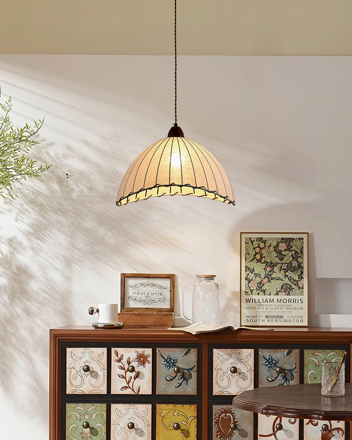 Sanna fabric dome pendant lamp front hanging view above vintage patterned cabinet cozy home