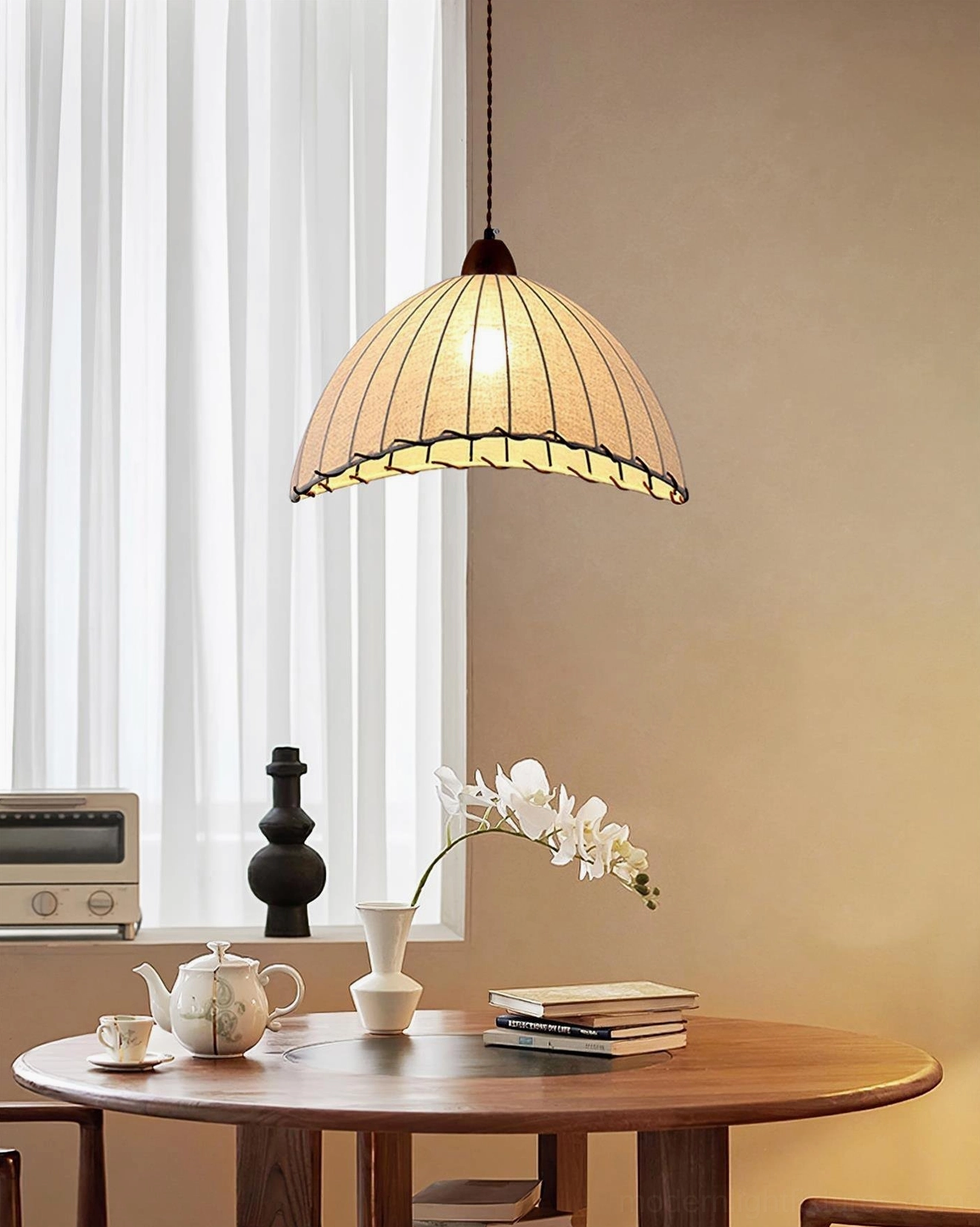 Sanna ribbed fabric pendant lamp above vintage cottage dining table, warm ambient lighting