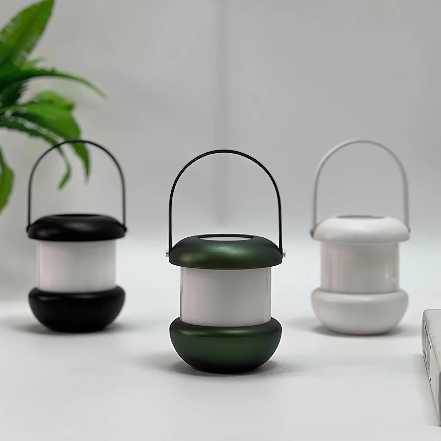Sarina LED portable table lantern lifestyle image - portable ambient lighting for bedroom, living room, patio use