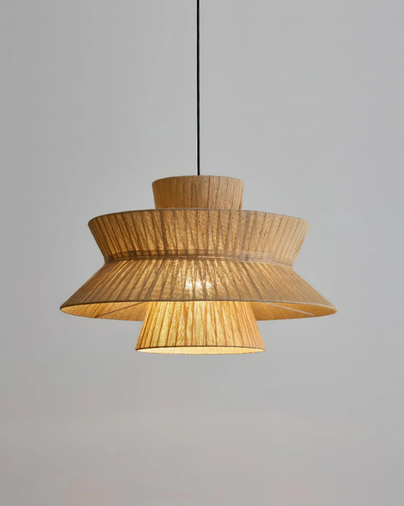 Satori layered pendant light overhead view showcasing multi-tiered flared silhouette and natural jute weave