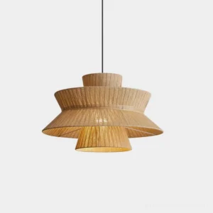 Satori tiered pendant light with layered woven jute shade, front studio view showing sculptural architectural design