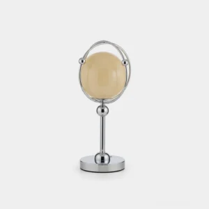 Saturn Hoop Table Lamp with polished chrome frame and beige glass sphere on white background - modern sculptural table lighting