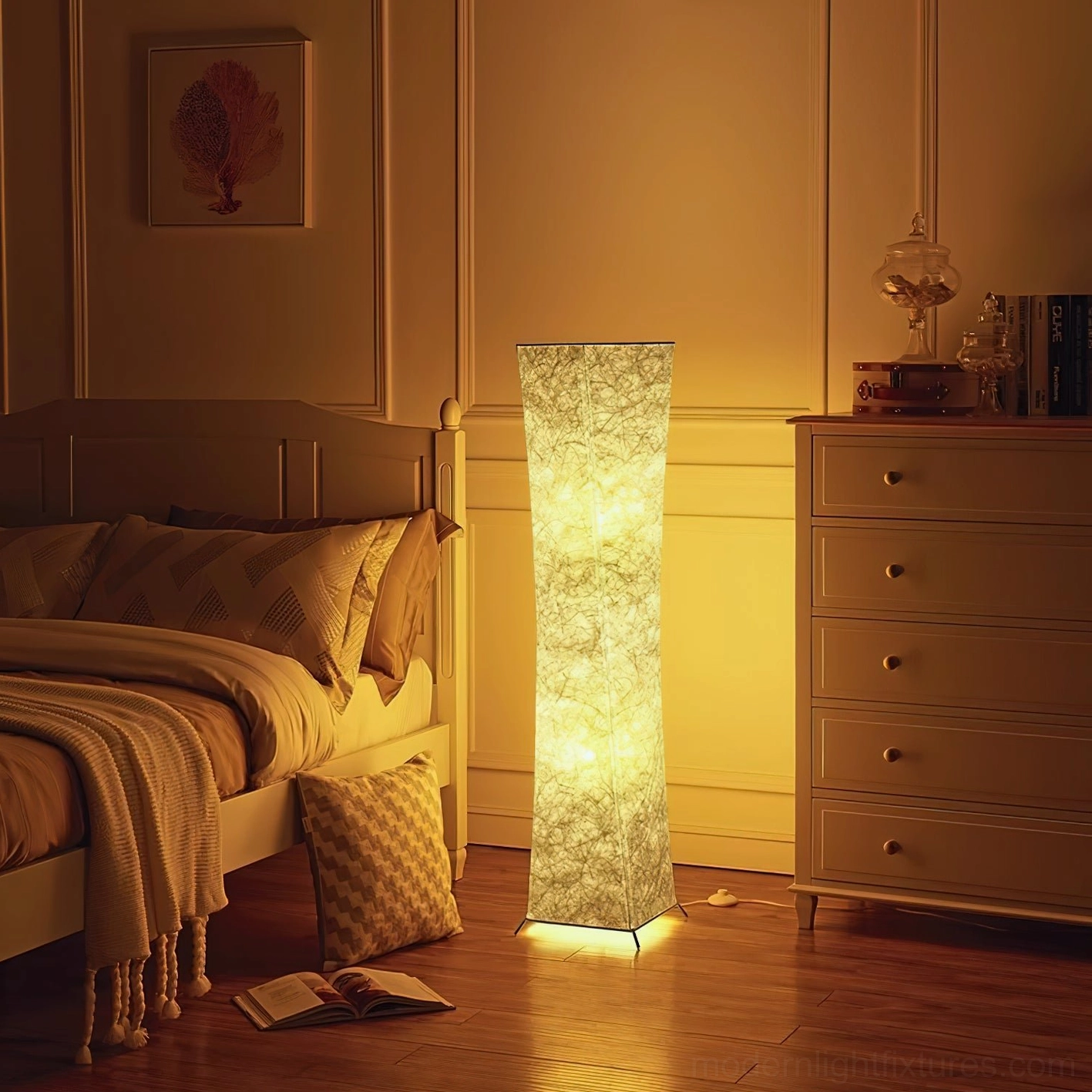 Saura floor lamp in cozy bedroom setting at night emitting warm yellow light, matching warm-toned bedroom decor