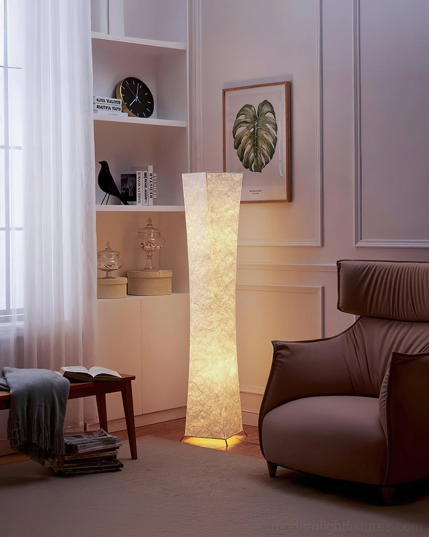 Saura minimalist floor lamp in living room lounge area with soft natural daylight and neutral home decor