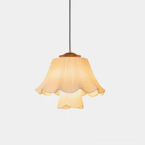 Savena pleated pendant lamp with single-tier ruffled fabric shade in warm beige, front close-up view showing scalloped edge and brass metal top
