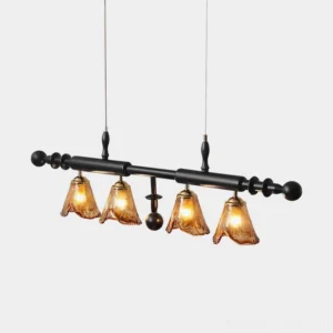 Savoy 4-light linear pendant chandelier with matte black metal frame and amber rippled glass shades front overhead studio view