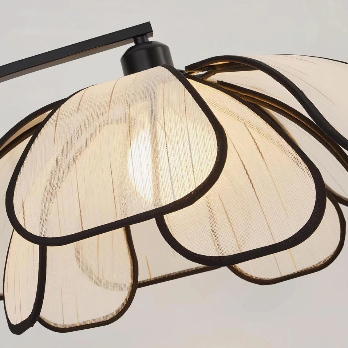 Savoy arc floor lamp positioned in living room corner, demonstrating ambient lighting for reading and relaxation