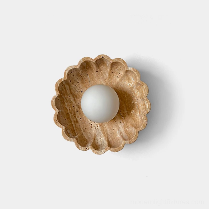 Scallop shell wall sconce with travertine and frosted glass - front view on white background
