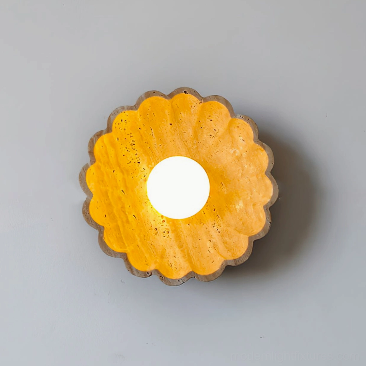 Scallop wall sconce Japanese wabi-sabi organic modern aesthetic with natural stone imperfections