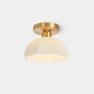 Scalloped brass semi-flush ceiling light with frosted acrylic shade, front close-up view showing vintage mid-century modern design