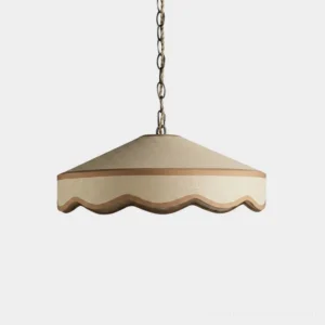 Mellune scalloped fabric pendant light with wavy hem and sheer lower band, cream coolie shade with brass-tone adjustable chain, studio front view