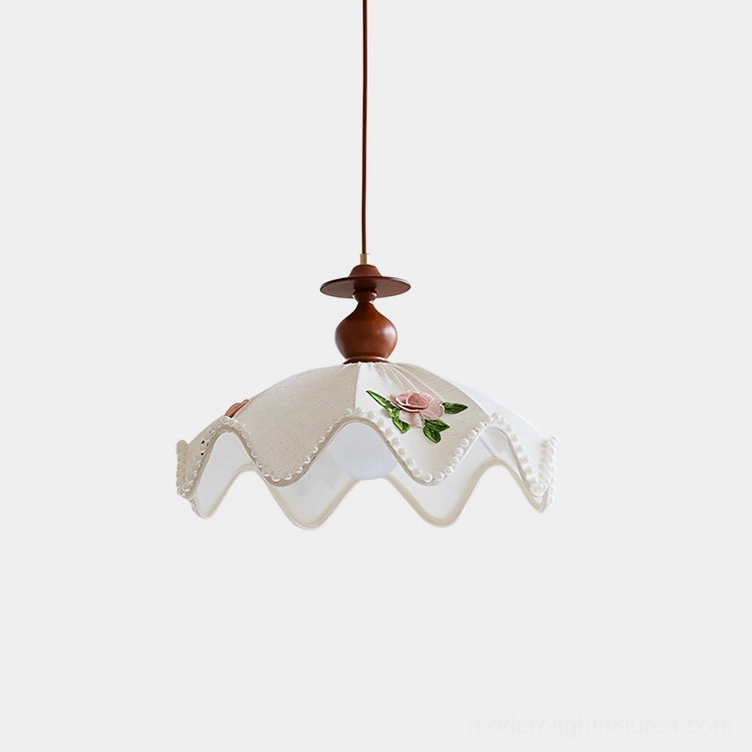 Scalloped floral pendant light with cream fabric shade and pearl-beaded edge detail, front view