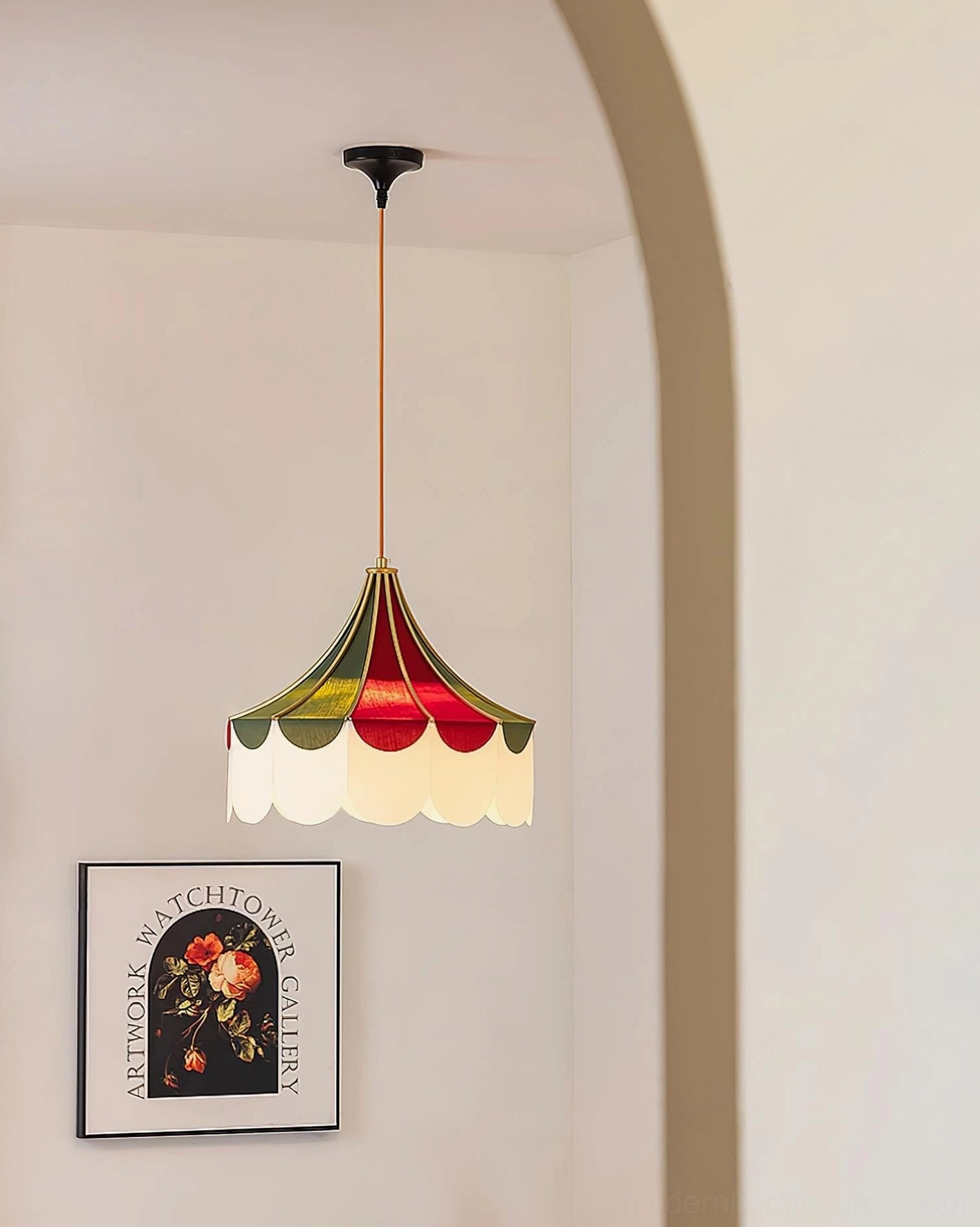 Modern circus-inspired pendant light in archway hallway with vintage French country aesthetic and decorative wall art