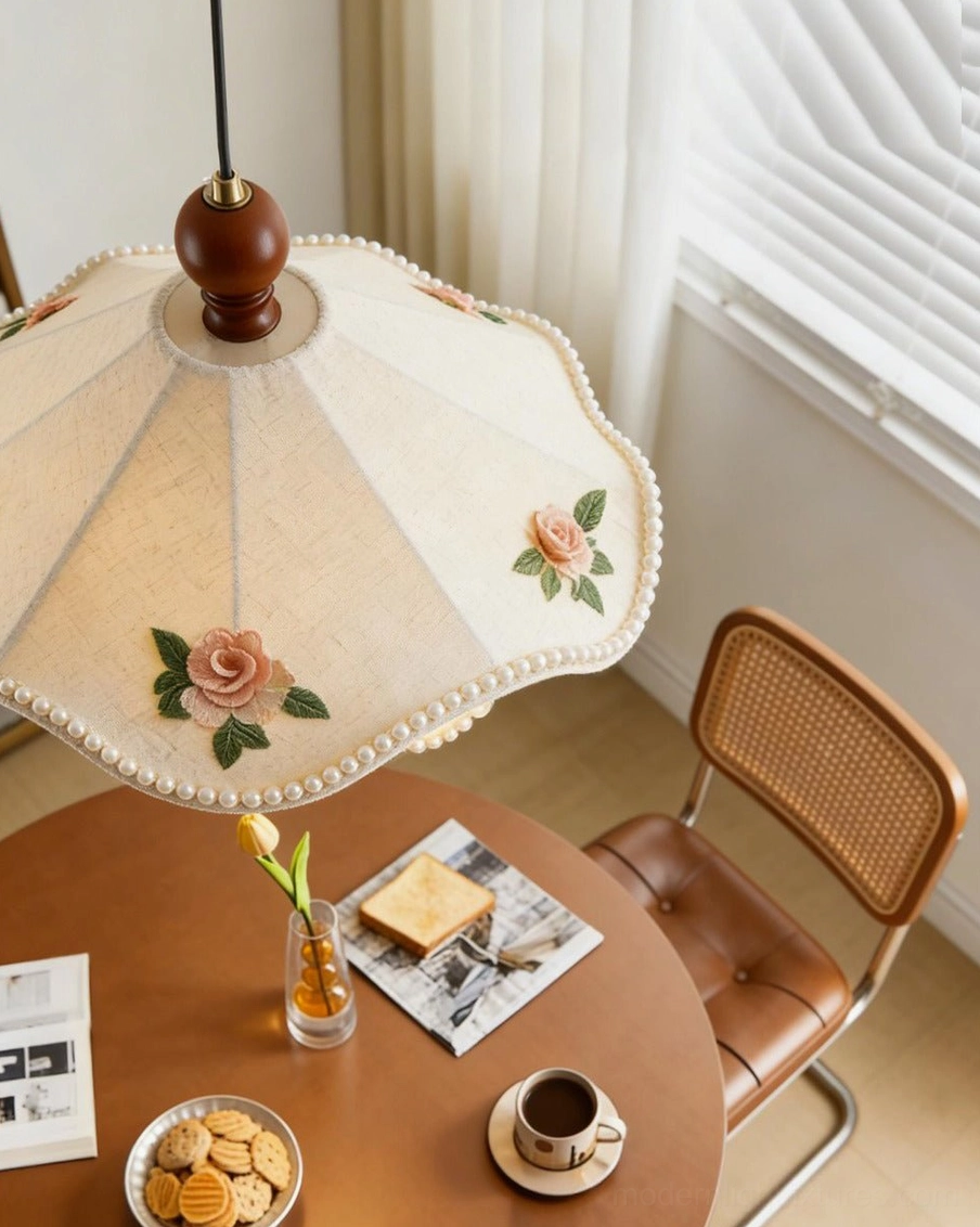 Scalloped fabric pendant light bottom-up close detail showing embroidered roses, beaded hem, and wood ball finial