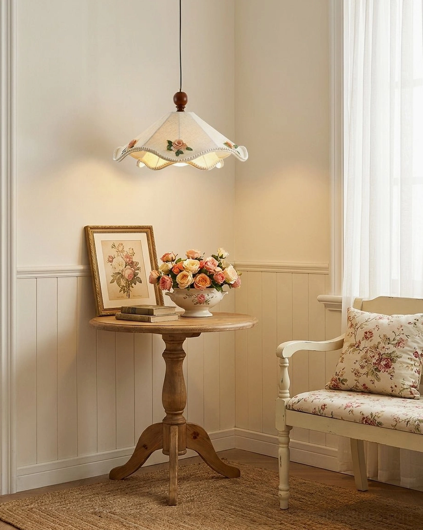 Scalloped fabric pendant light in vintage farmhouse entryway with neutral decor and side table