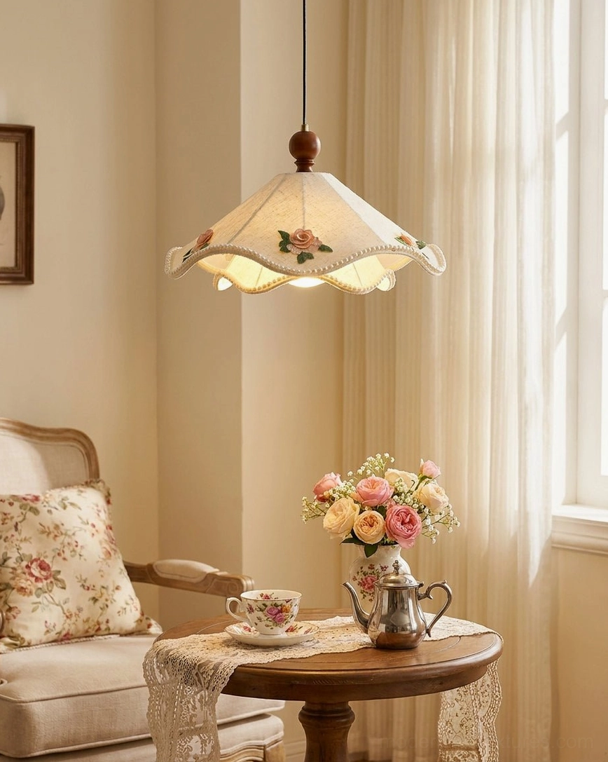 Scalloped fabric pendant light with warm wood finial hanging in cozy living room with soft neutral decor