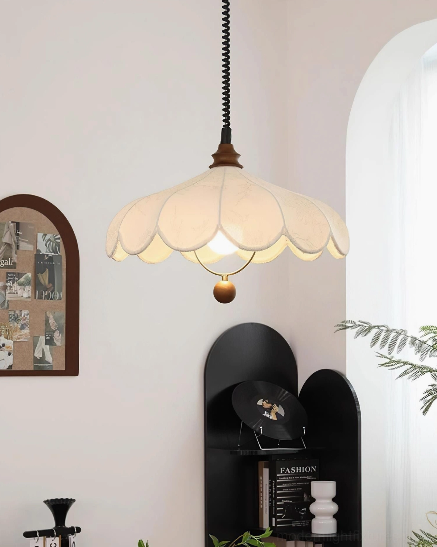 Lilea Petals pendant lamp installed in retro home interior with arched window, side view