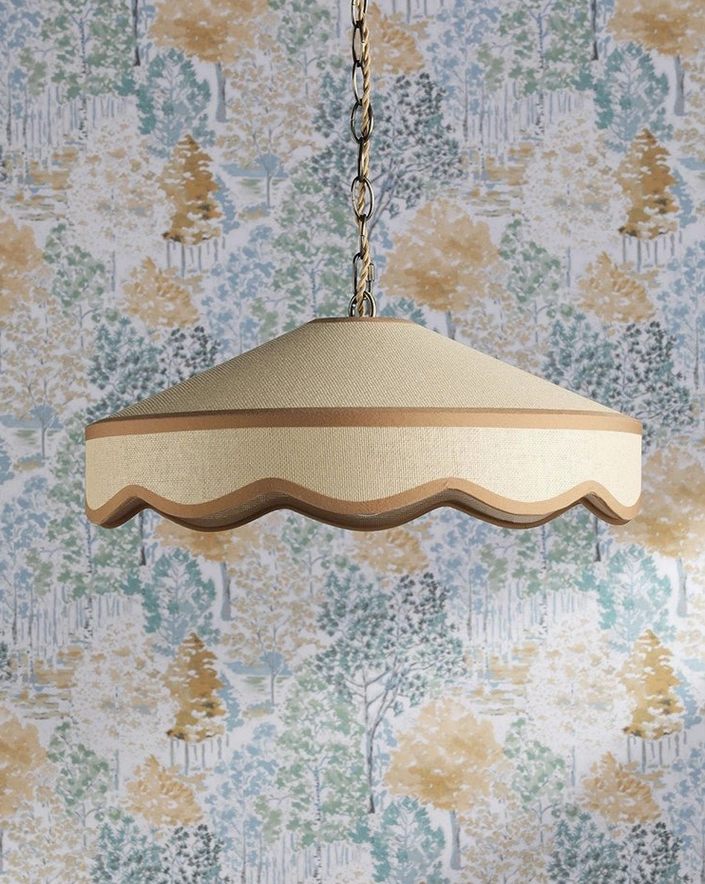 Scalloped fabric pendant light close-up of sheer lower band and decorative wavy trim detail